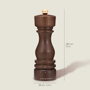 A Cole & Mason London Walnut Salt or Pepper Mill made from dark walnut wood stands upright, with its height (180 mm, 7.2 in) and width (58 mm, 2.4 in) indicated.