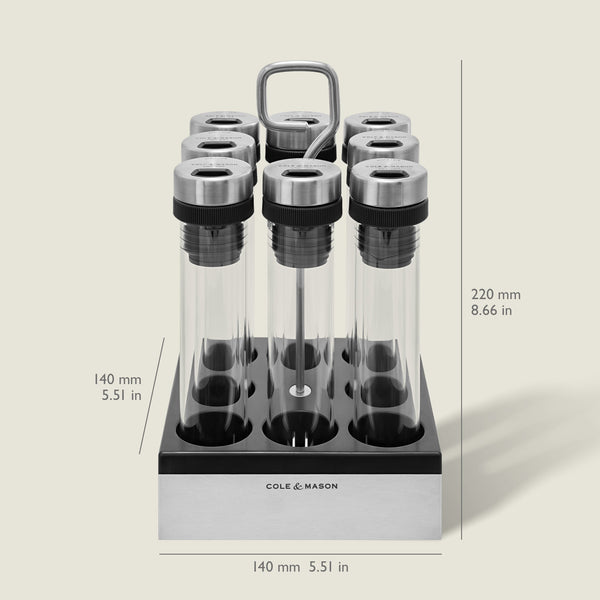 The Shadwell Countertop Spice Storage by Cole & Mason features eight airtight glass tubes with metal lids in a sleek black and silver stand—perfect for stylish, organized countertop storage (220mm H x 140mm W x 140mm D).